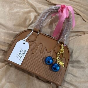 Cheyenne Chanel Tan Satchel with Pink and Blue Details